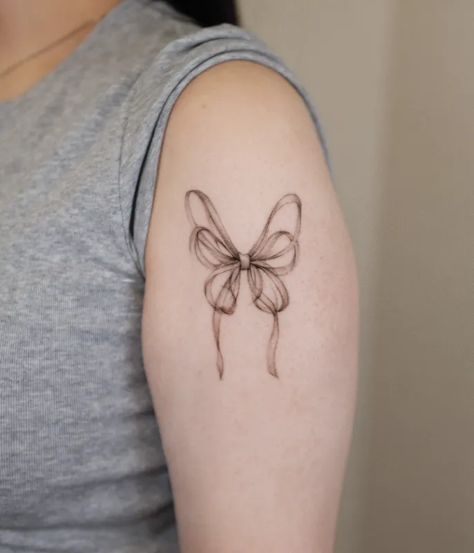 Abstract Ribbon Style Butterfly Arm Tattoo