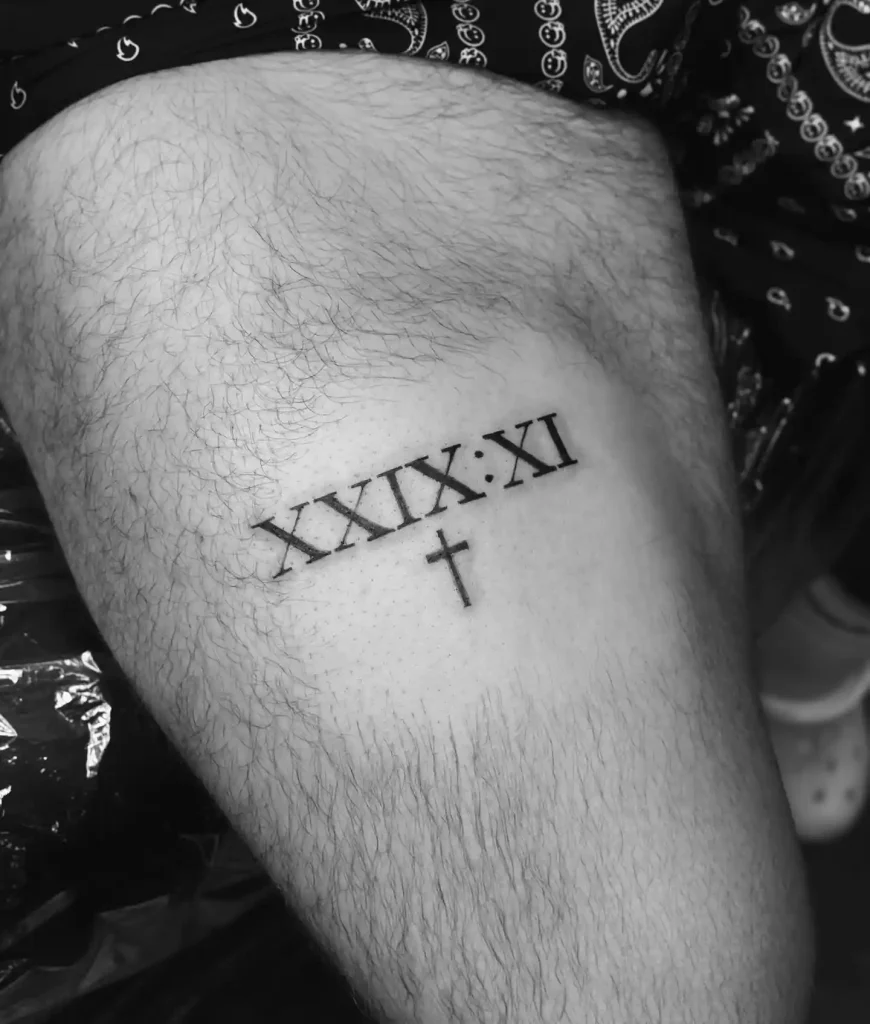 Bold Date with Cross on Thigh