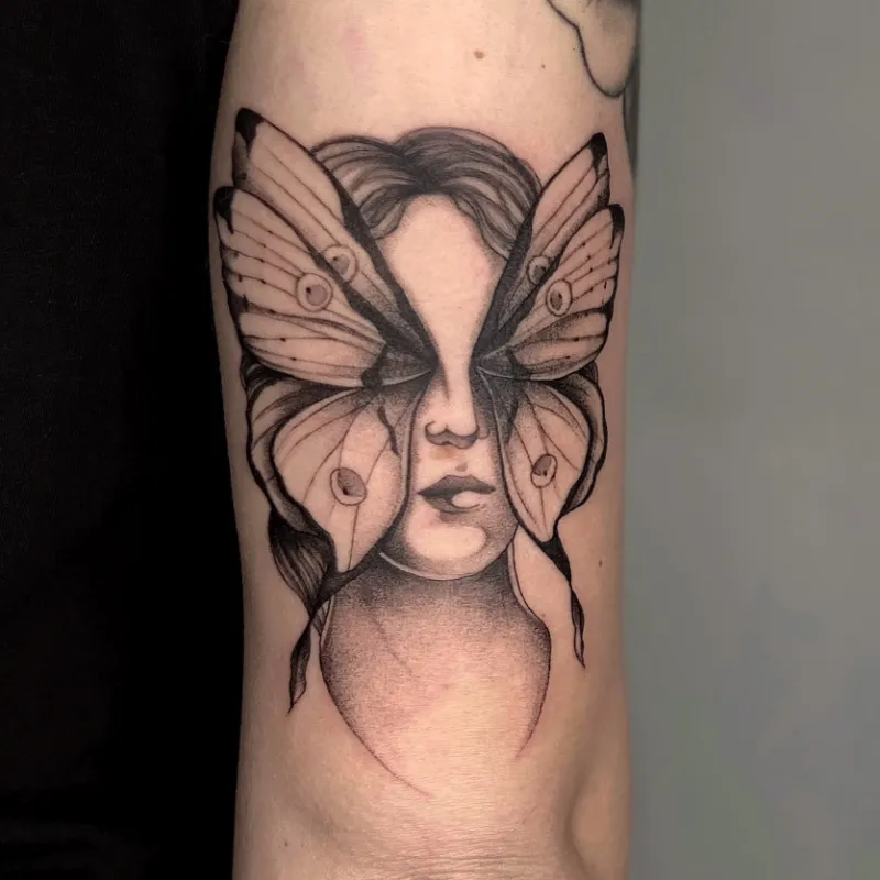 Surreal Butterfly Face Fusion Blackwork Tattoo
