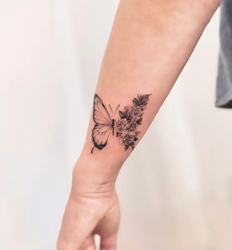 Butterfly and Rose Blackwork Tattoo