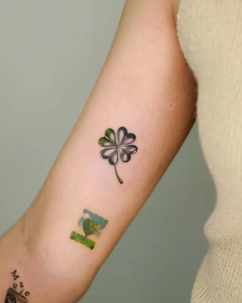 Chrome Clover and Pixel Art on Forearm