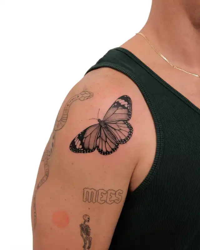 Classic Black Butterfly Shoulder Tattoo