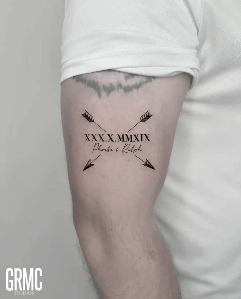 Crossed Arrows and Names on Upper Arm