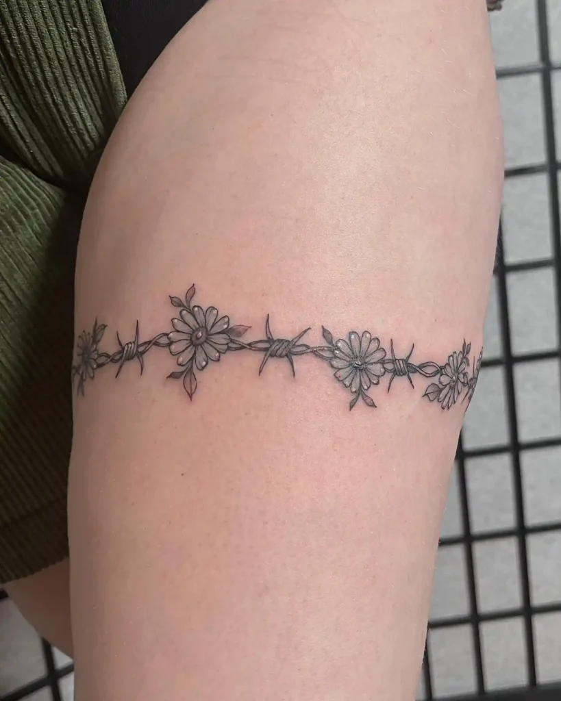 Daisy and Barbed Wire Band on Upper Arm