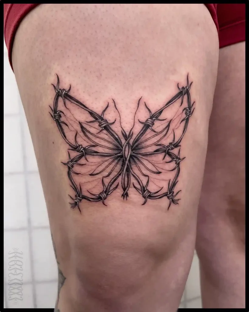 Delicate Barbed Wire Butterfly on Knee