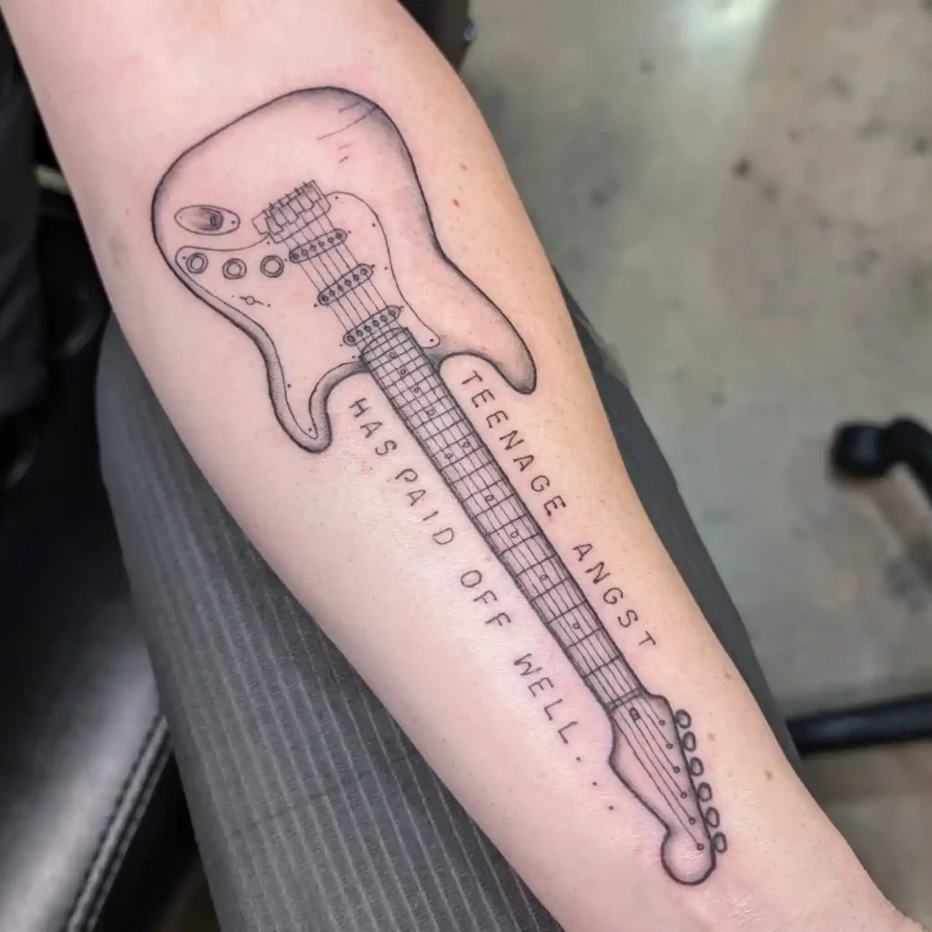 Electric Guitar with Song Lyrics on Forearm