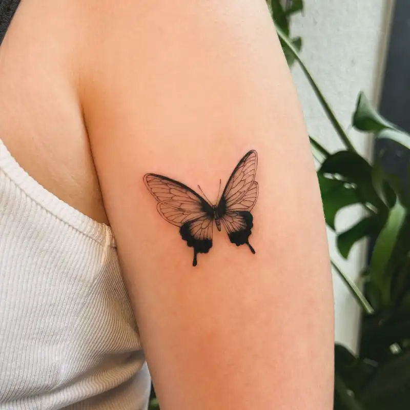 Elegant Fine Line Butterfly Tattoo