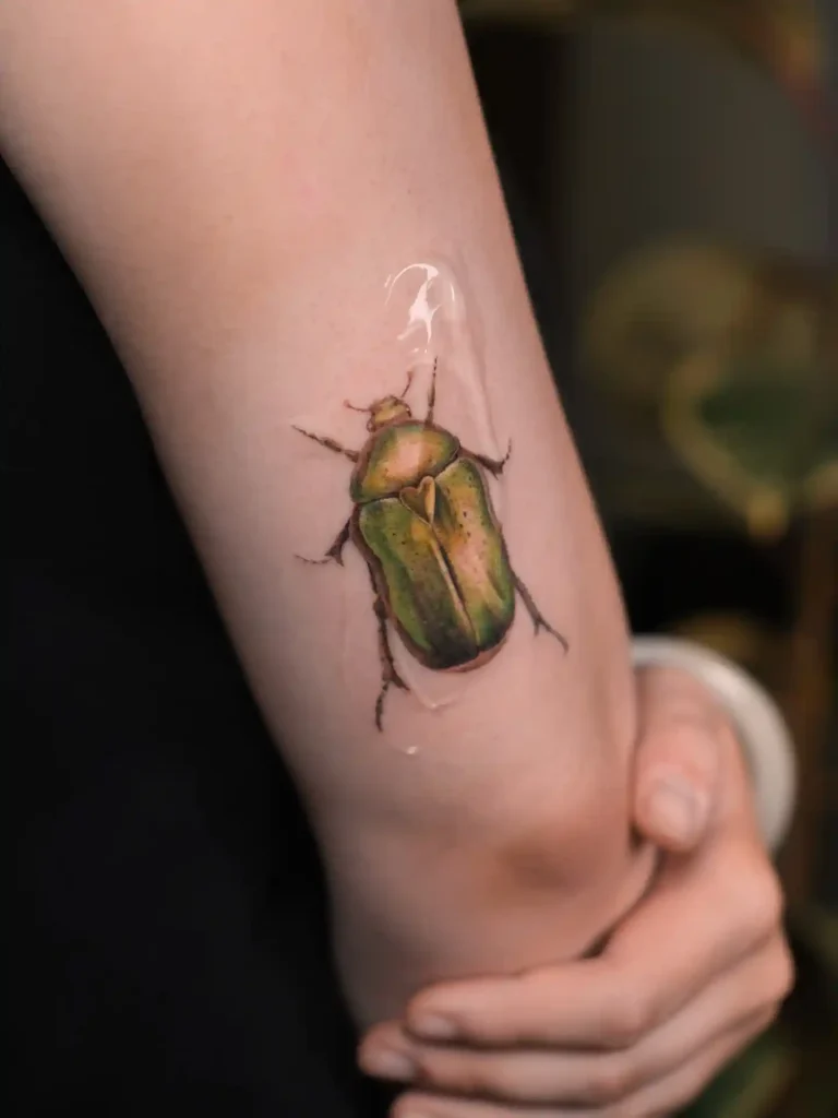 Emerald June Bug on Forearm
