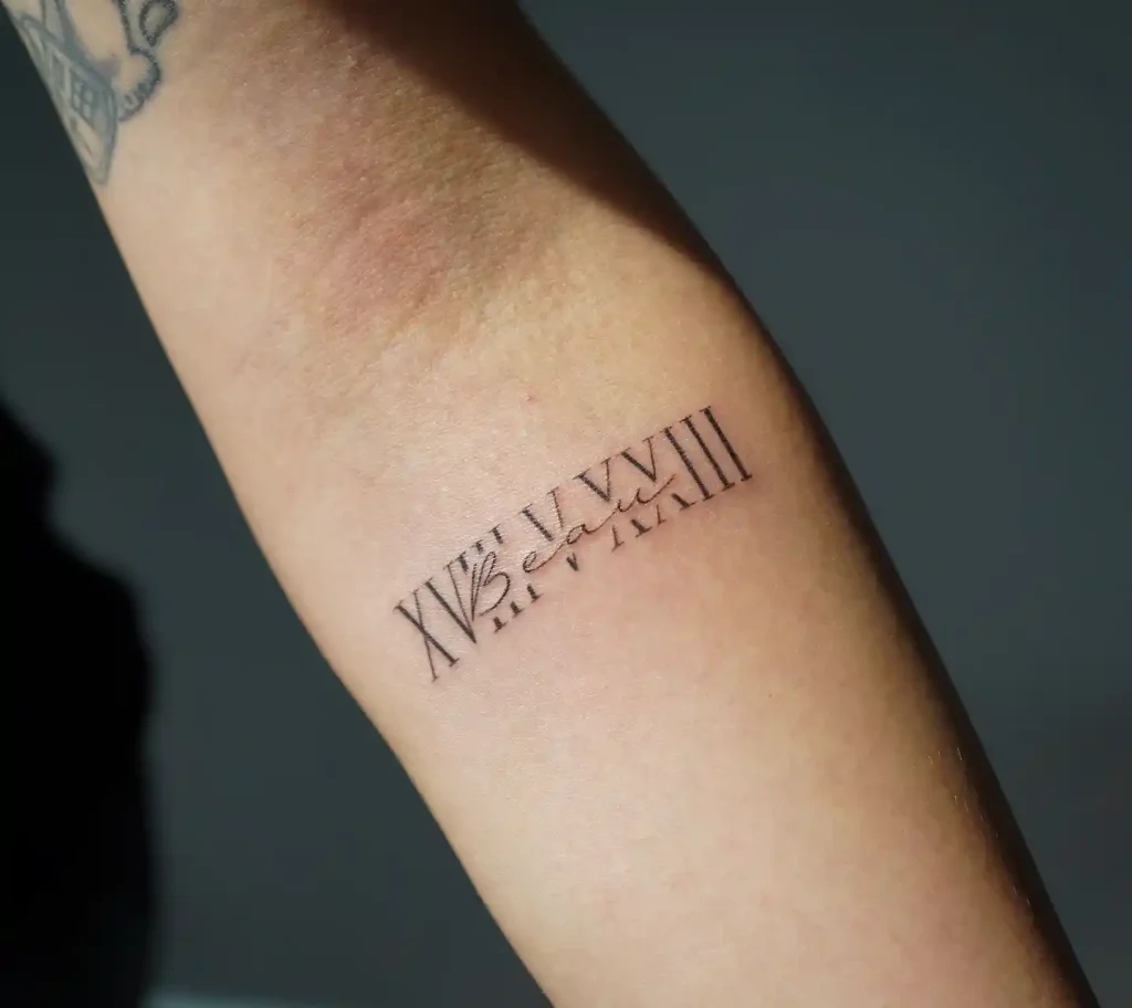 Intertwined Name and Date on Inner Forearm
