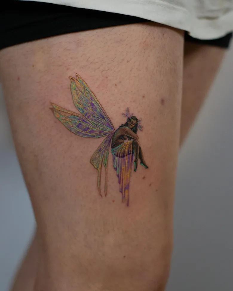Iridescent Fairy Tattoo with Dreamlike Wings