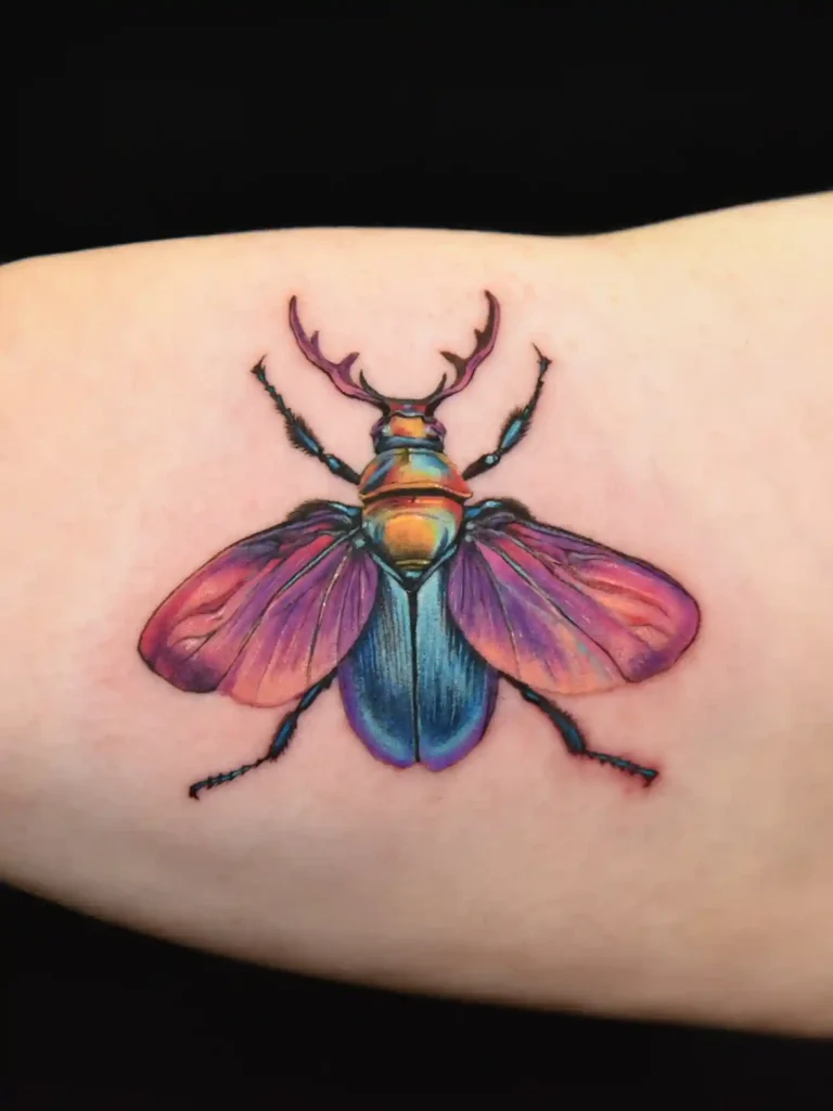 Iridescent Flight Beetle on Forearm