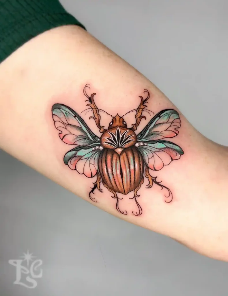 Jeweled Winged Beetle on Arm