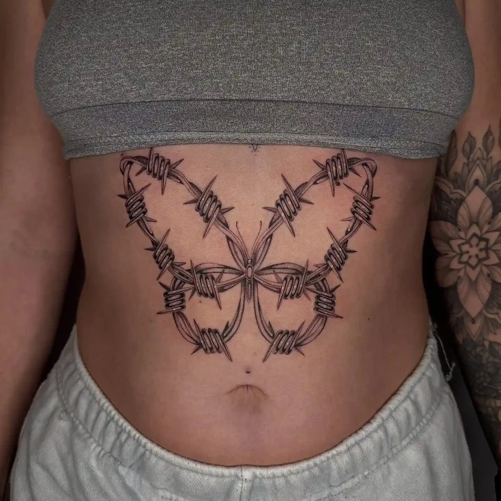 Large Barbed Wire Butterfly on Stomach