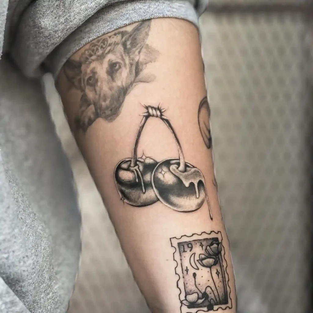 Melting Cherries on Barbed Wire on Inner Forearm
