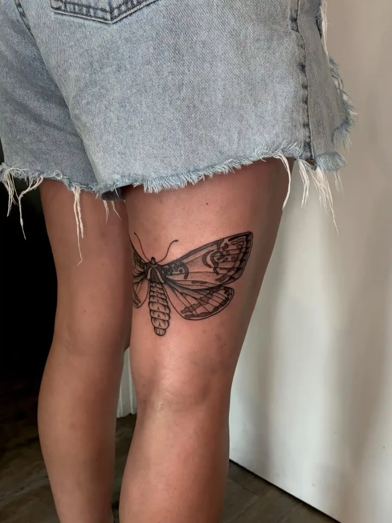 Minimal Moth Outline on Back of Thigh