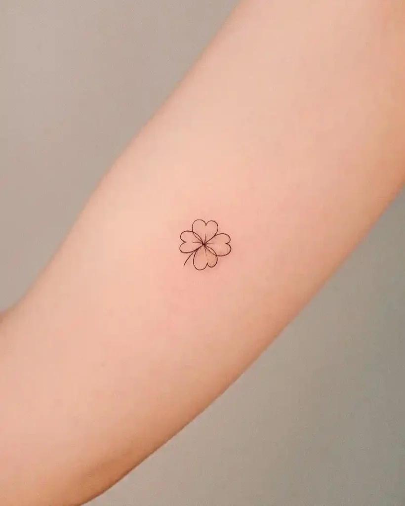 Minimalist Fine Line Clover on Forearm