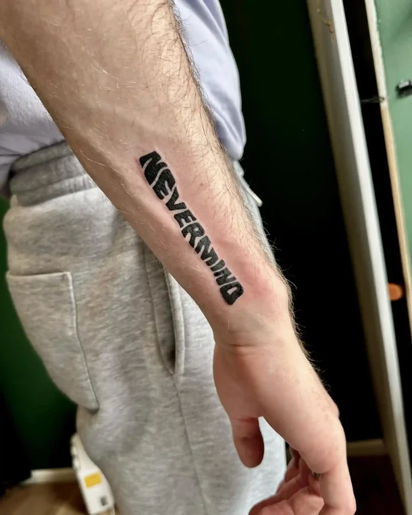 Nevermind Album Title on Forearm
