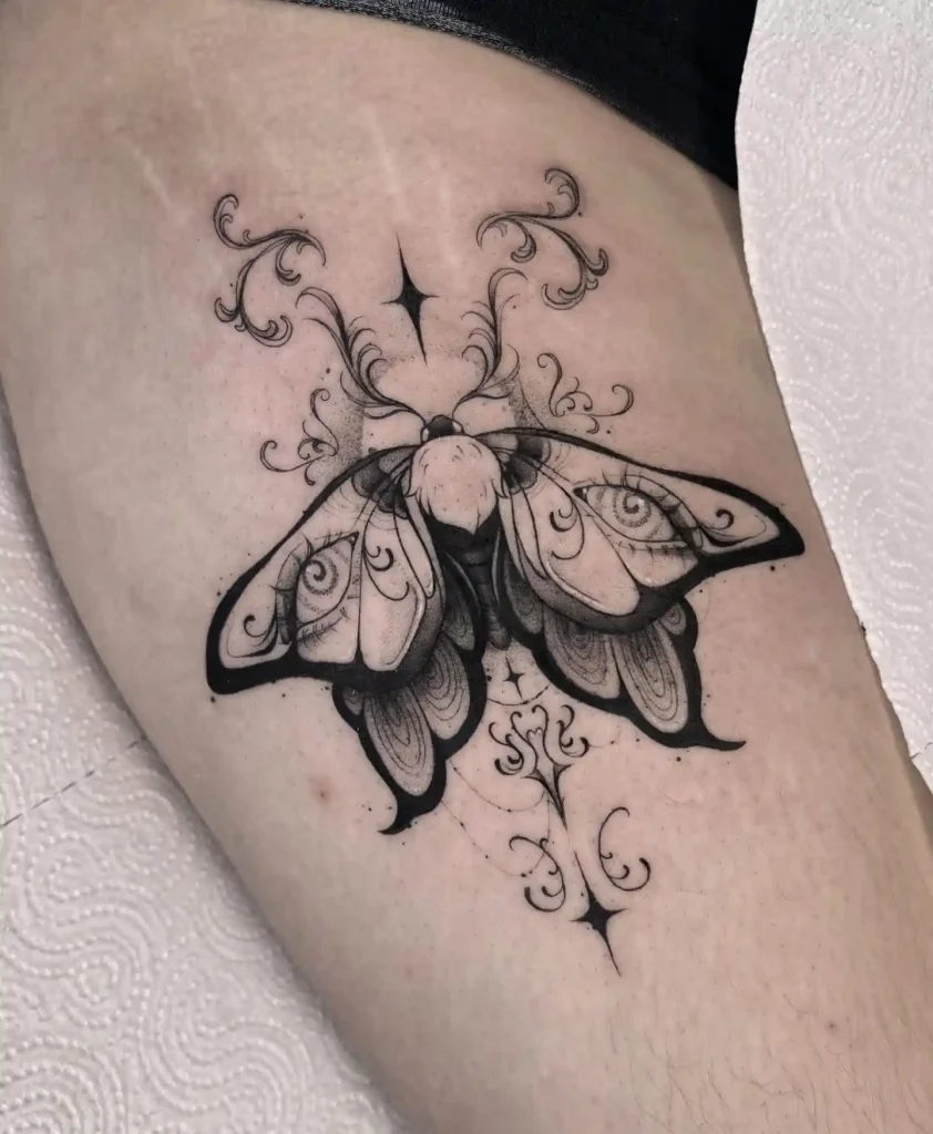 Ornamental Filigree Moth on Thigh