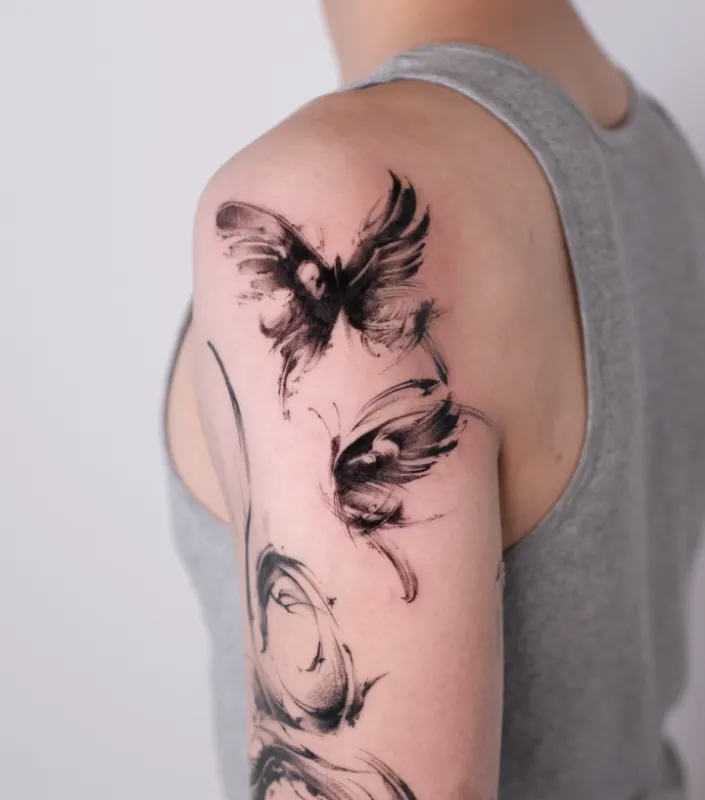 Painterly Butterfly Sleeve Accent Tattoo