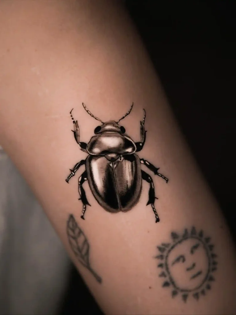 Polished Chrome Beetle on Forearm