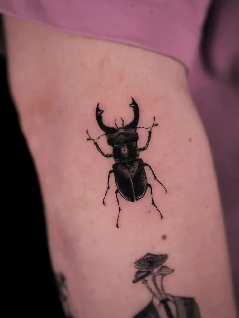Realism Blackwork Beetle on Forearm
