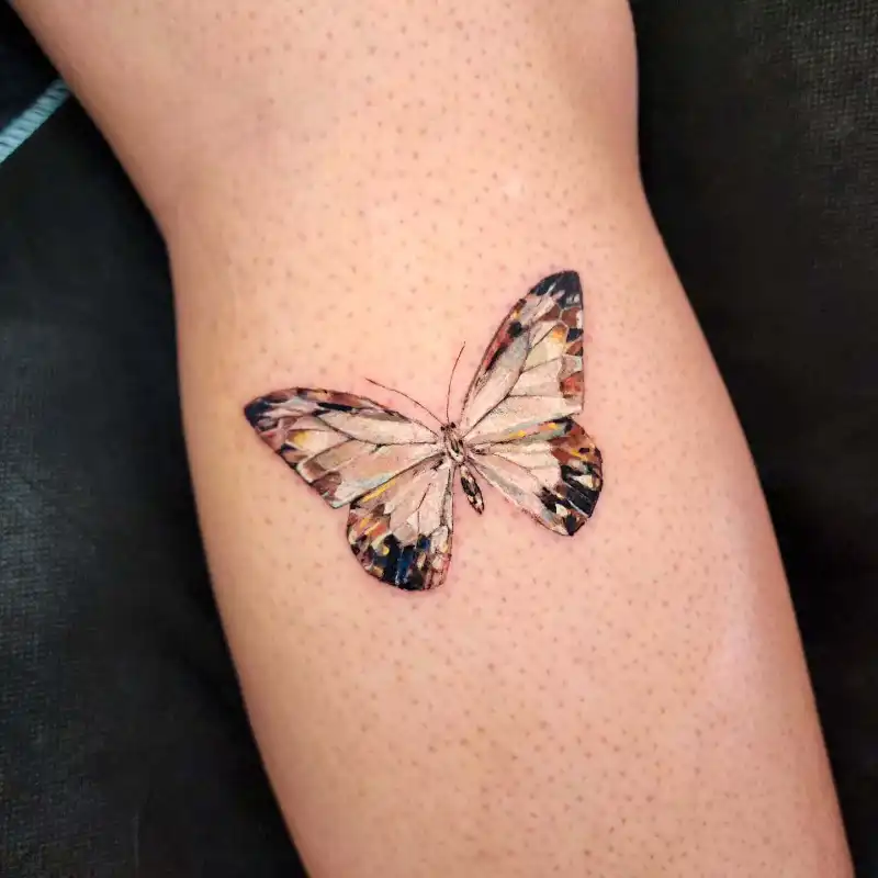 Realistic Butterfly Forearm Tattoo