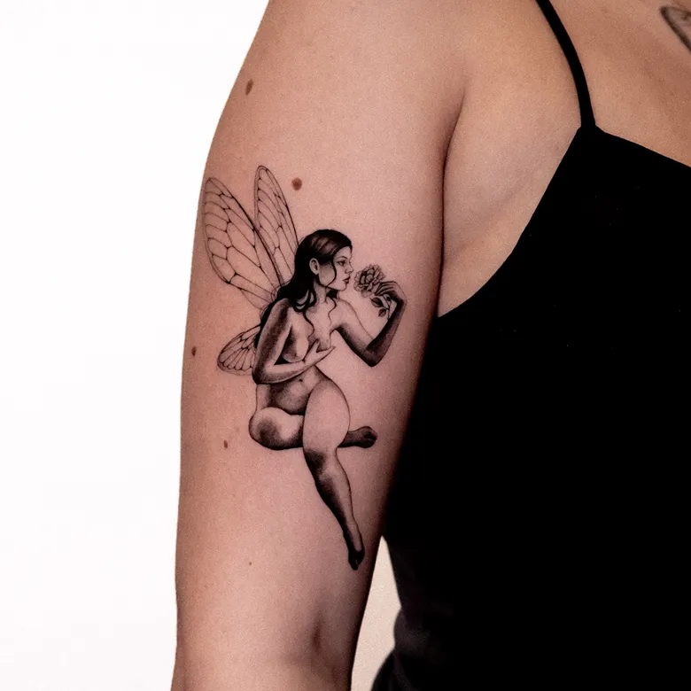 Realistic Fairy Tattoo with Floral Expression