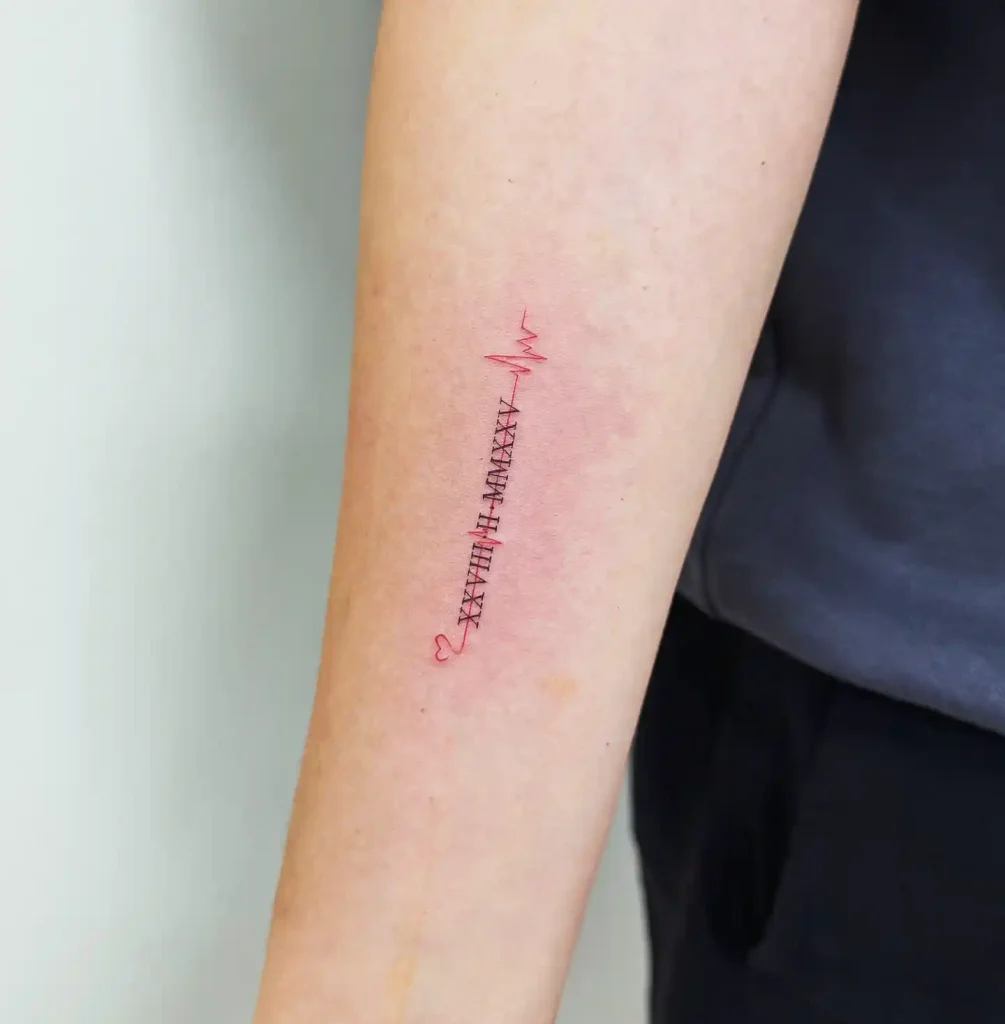 Red Ink Heartbeat Date on Forearm