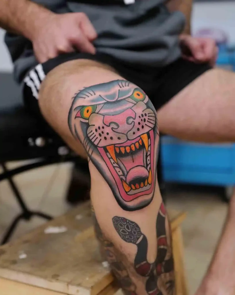 Roaring Panther Head on Knee
