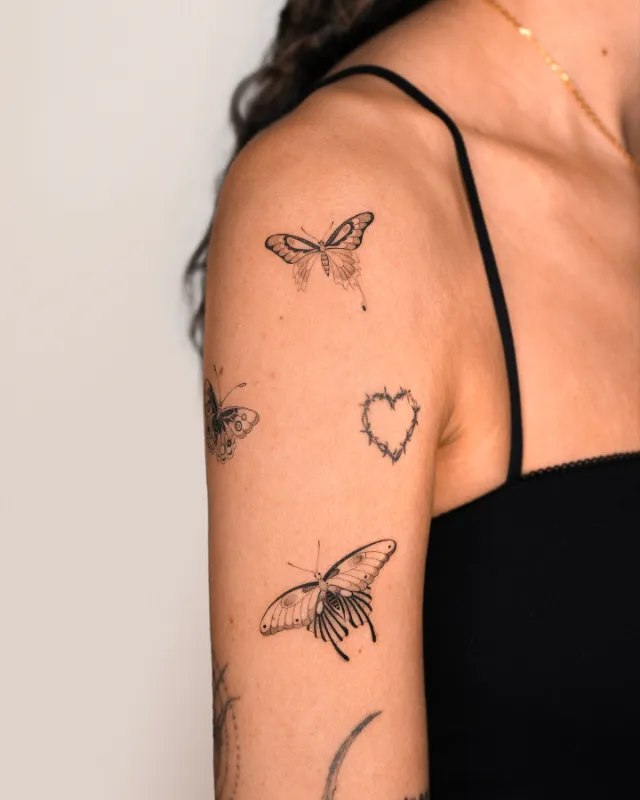 Small Butterfly Collection Arm Tattoo