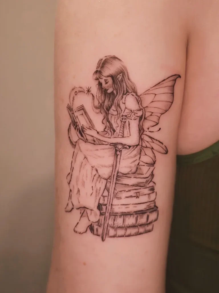 Storybook Fairy Tattoo with Book and Sword