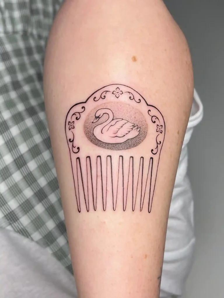 Swan in Decorative Comb Frame on Forearm