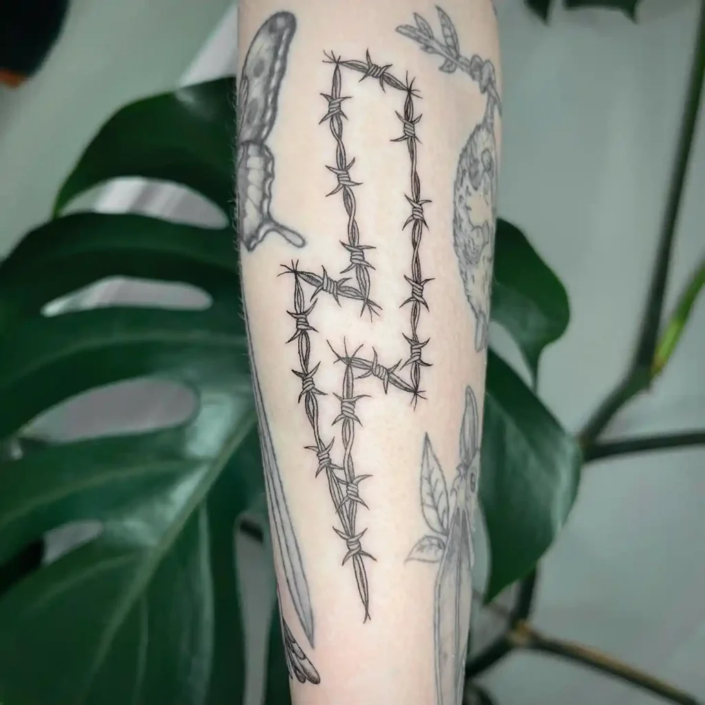 Barbed Wire Lightning Bolt on Inner Arm