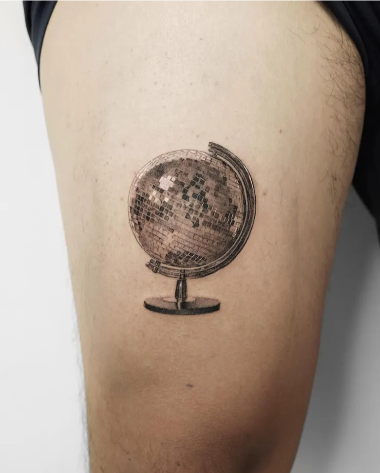 Disco Ball Inspired Globe Tattoo
