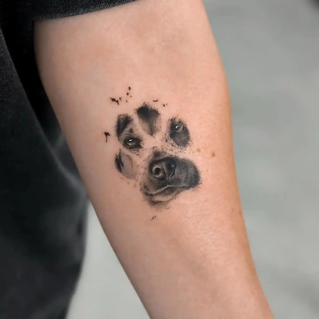 Dog Face within Paw Print on Forearm