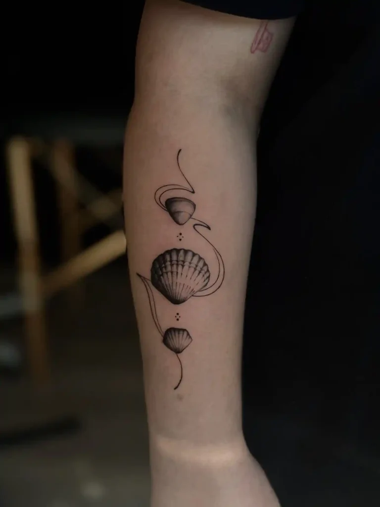 Flowing Scallop Composition with Swirls on Forearm