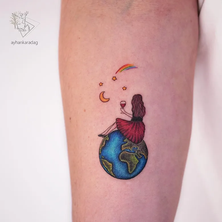Girl Sitting on the Globe Dreamscape Tattoo