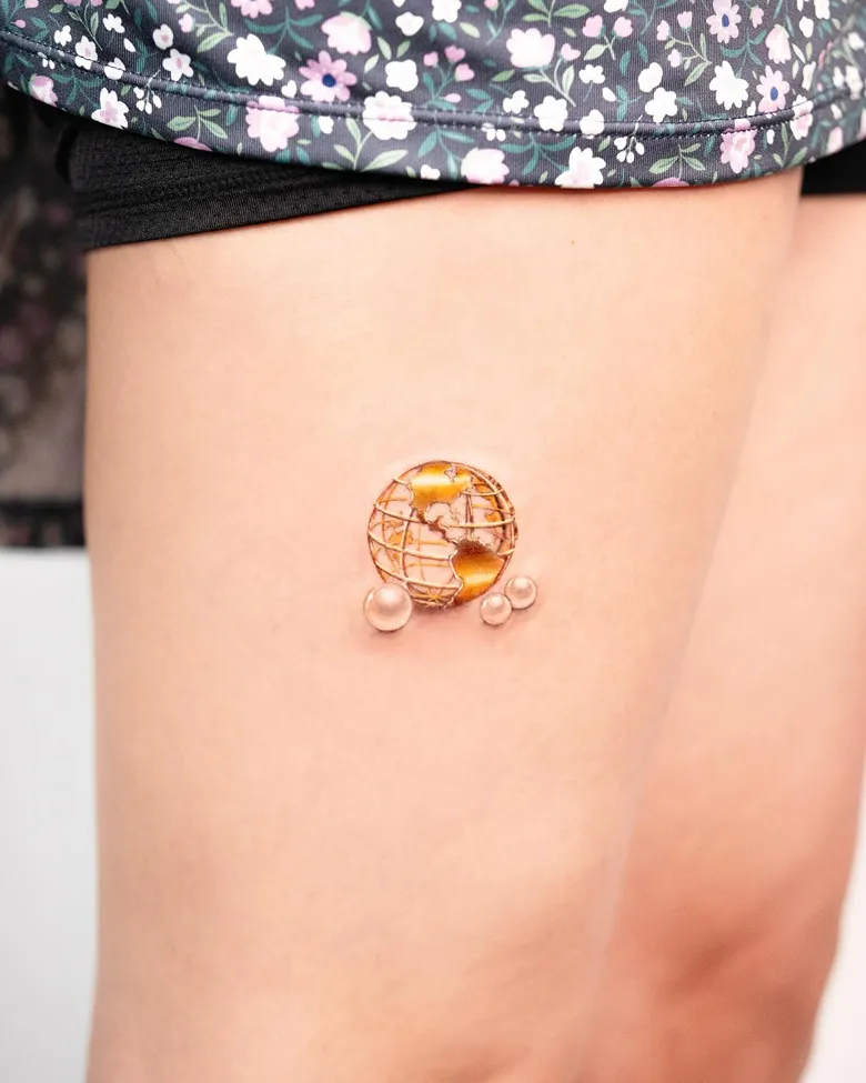 Golden Globe with Pearl Accents Tattoo