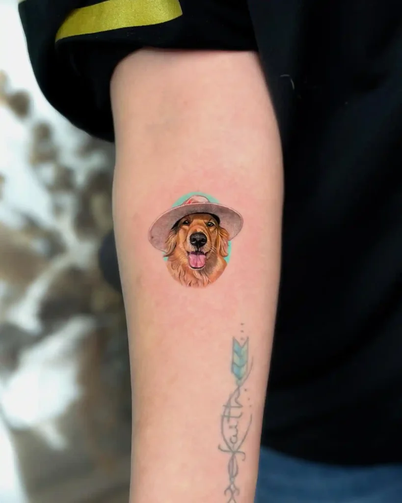 Golden Retriever in Sun Hat on Inner Arm