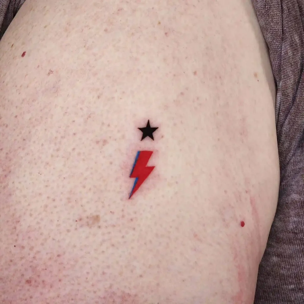 Minimalist Red Bolt and Star on Thigh