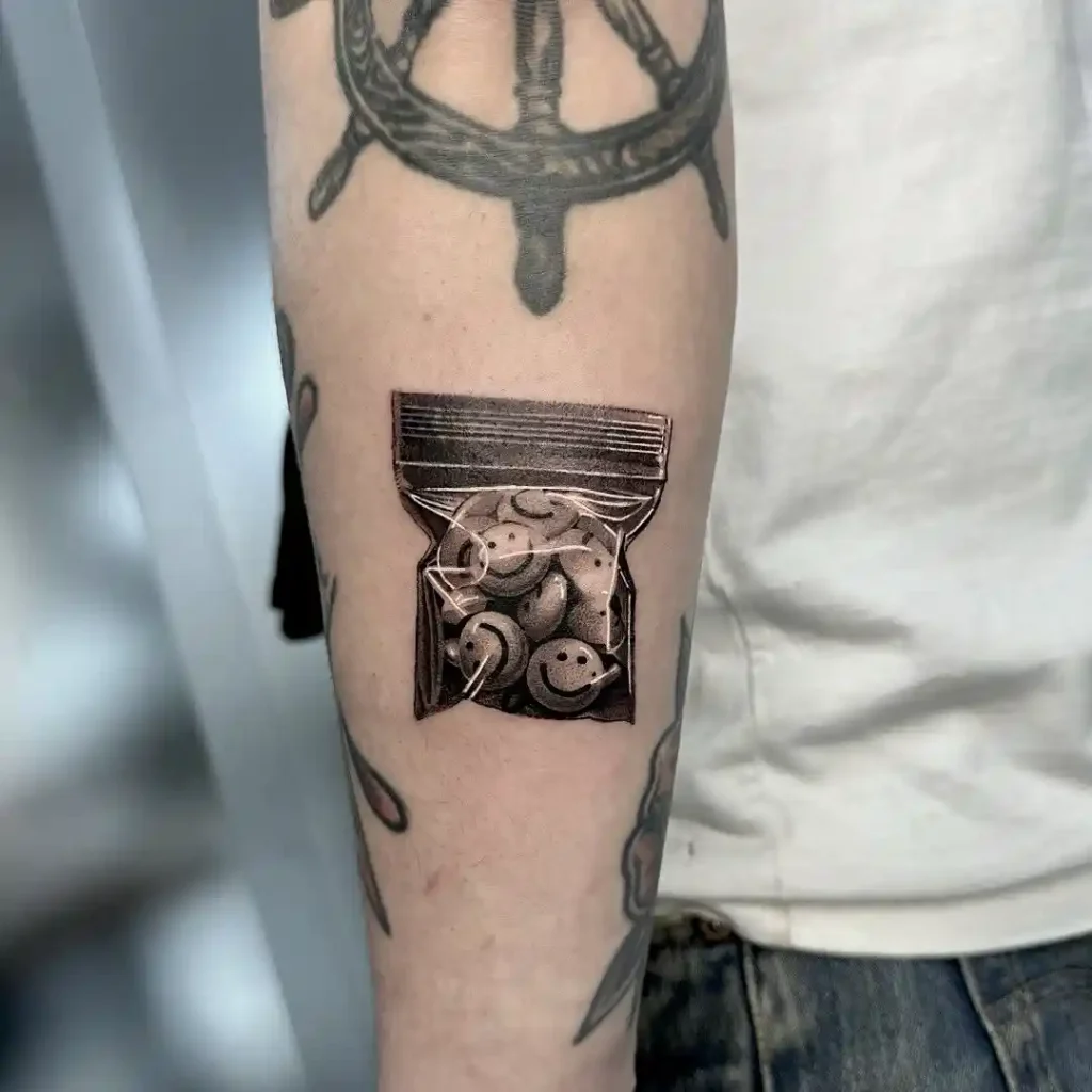 Plastic Baggy of Smile Pills on Inner Forearm
