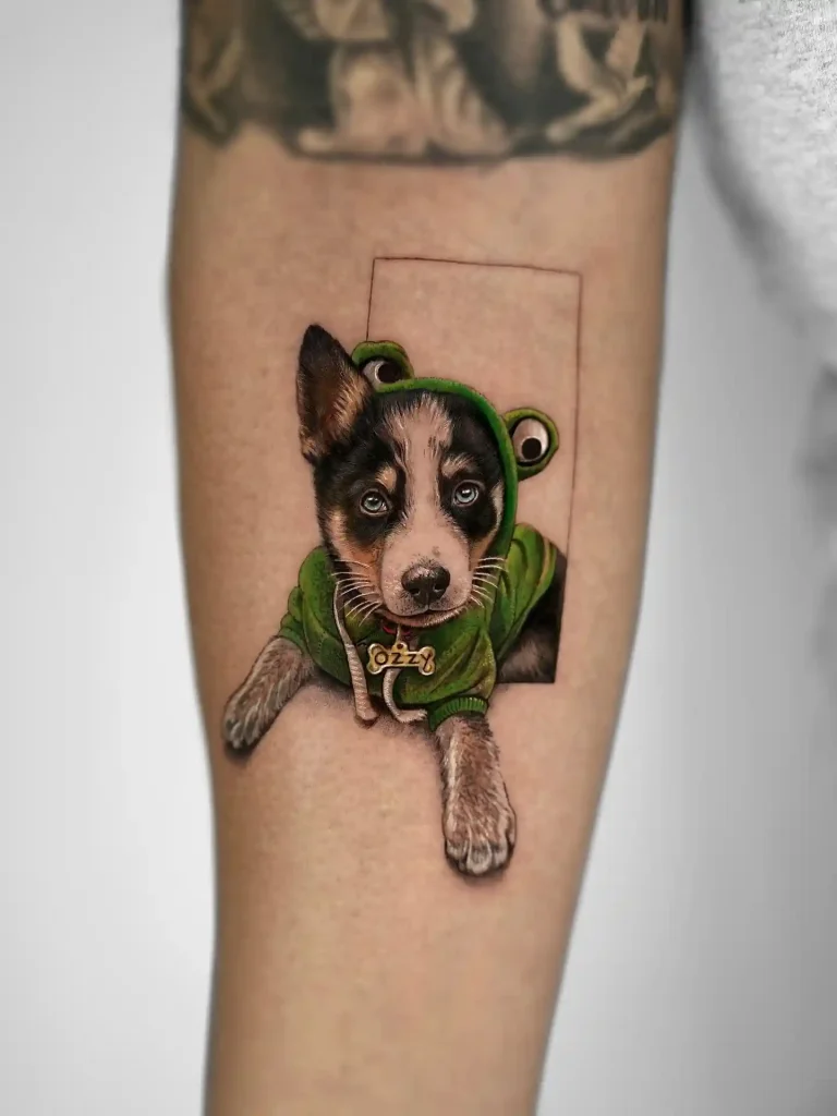 Puppy in Frog Hoodie with Name Tag on Forearm