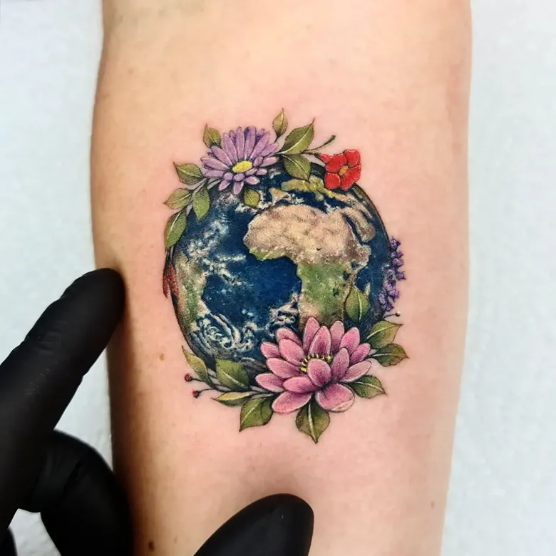 Realistic Floral Earth Tattoo
