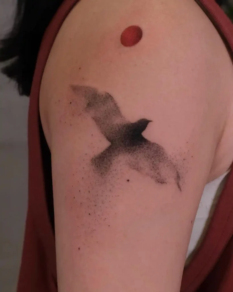 Silhouetted Bird in Flight on Shoulder