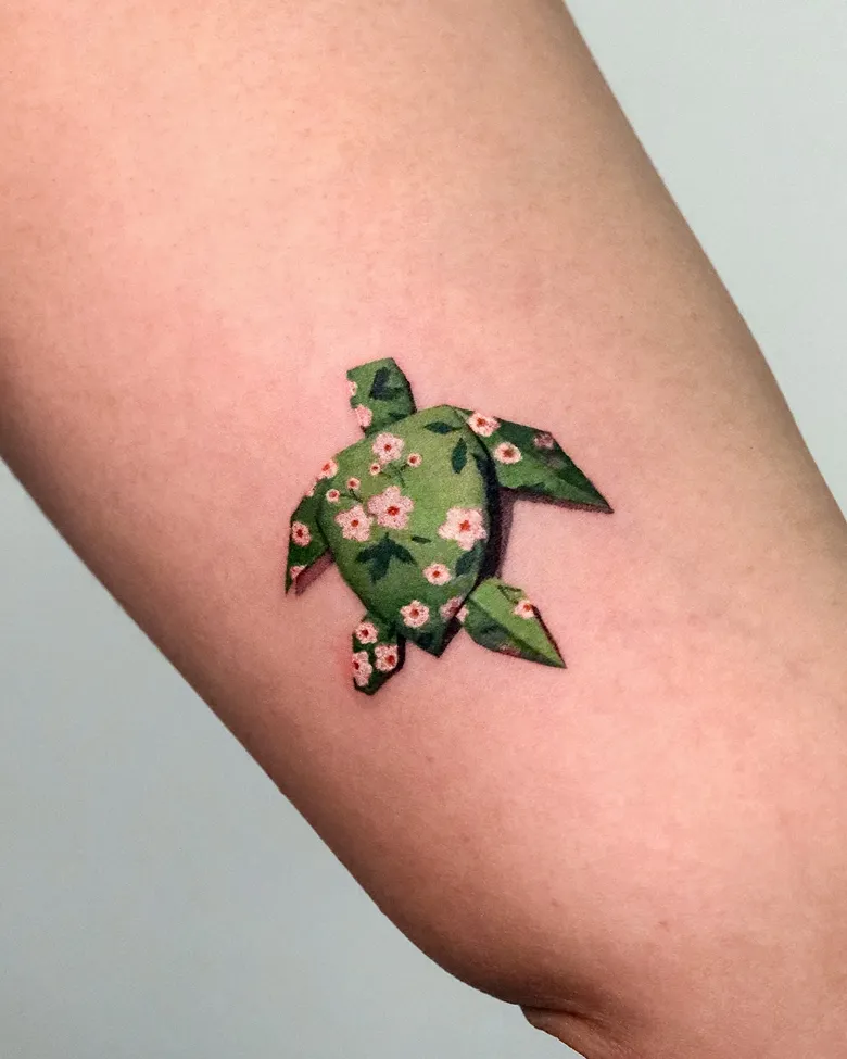 Artistic Origami Turtle Tattoo with Floral Pattern