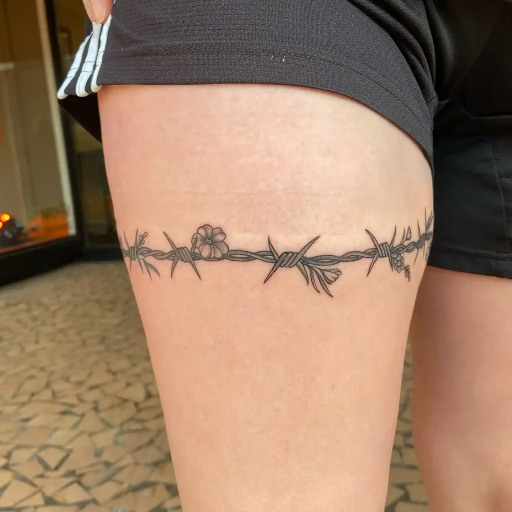 Barbed Wire and Wildflowers on Thigh