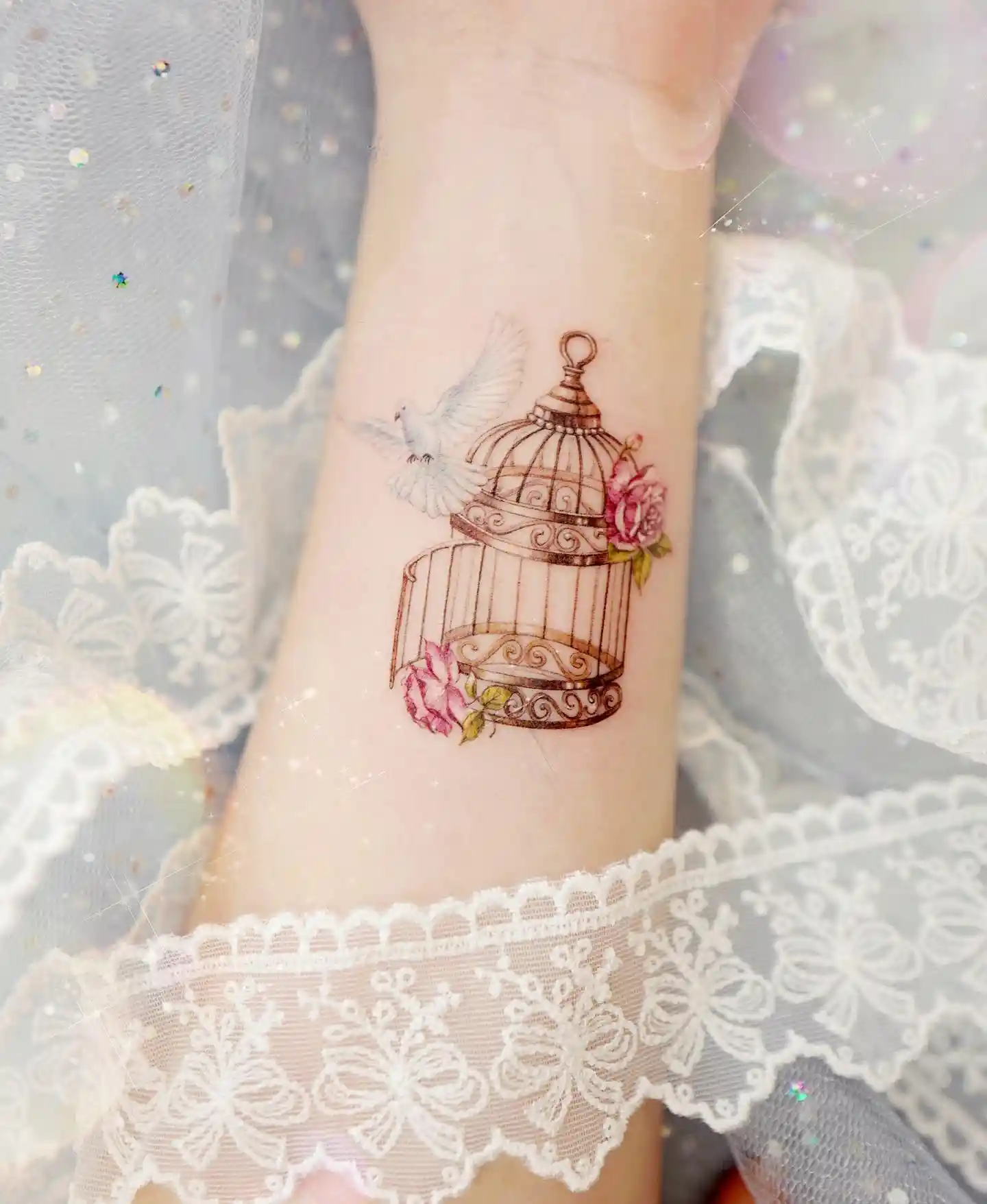 Birdcage and Dove on Inner Forearm