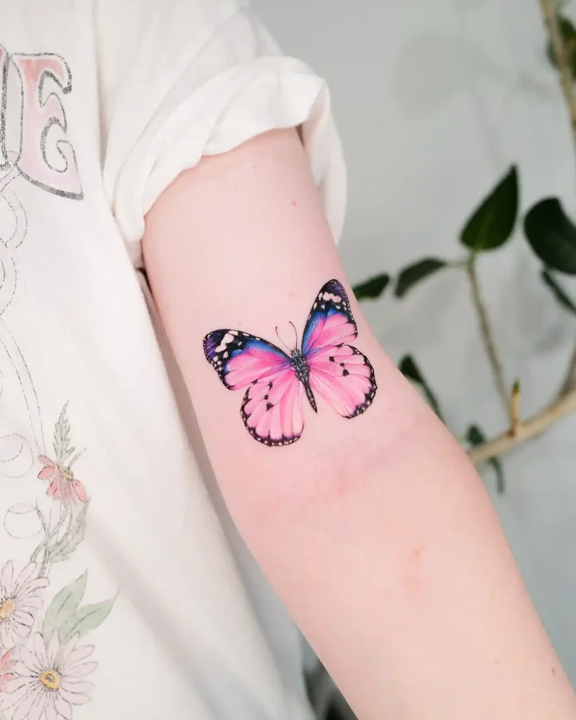 Bright Butterfly Design on Forearm