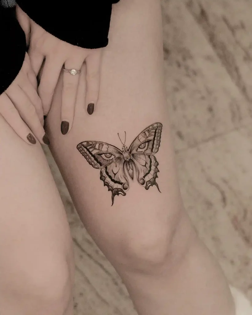 Butterfly with Realistic Eyes on Thigh