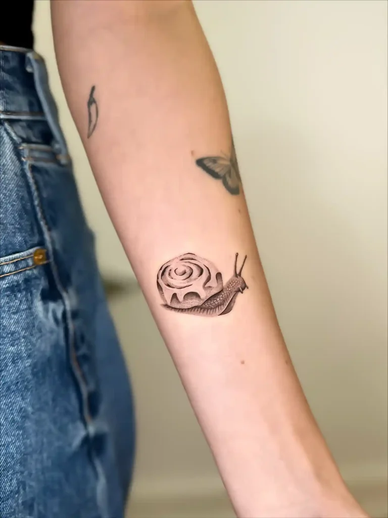 Cinnamon Roll Snail on Forearm